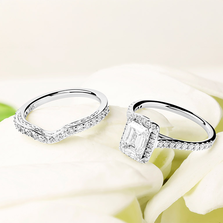 14kt White Gold Lab-Grown Diamond Cushion Halo Engagement Ring Set On Prop