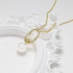 14kt Gold Vermeil Claddagh Pearl Drop Necklace On Prop - Gallery Thumbnail Image